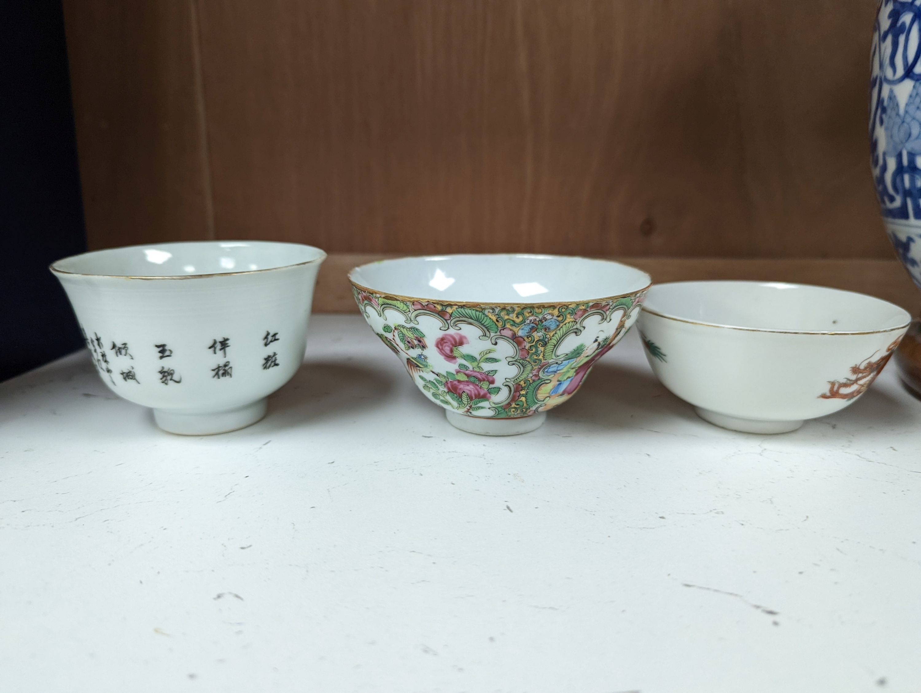 Nine Chinese porcelain tea bowls, tallest 6 cm.